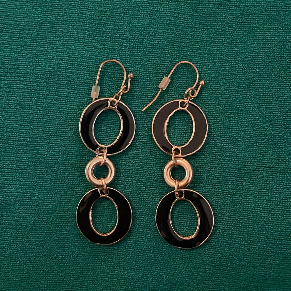 Black and golden earrings